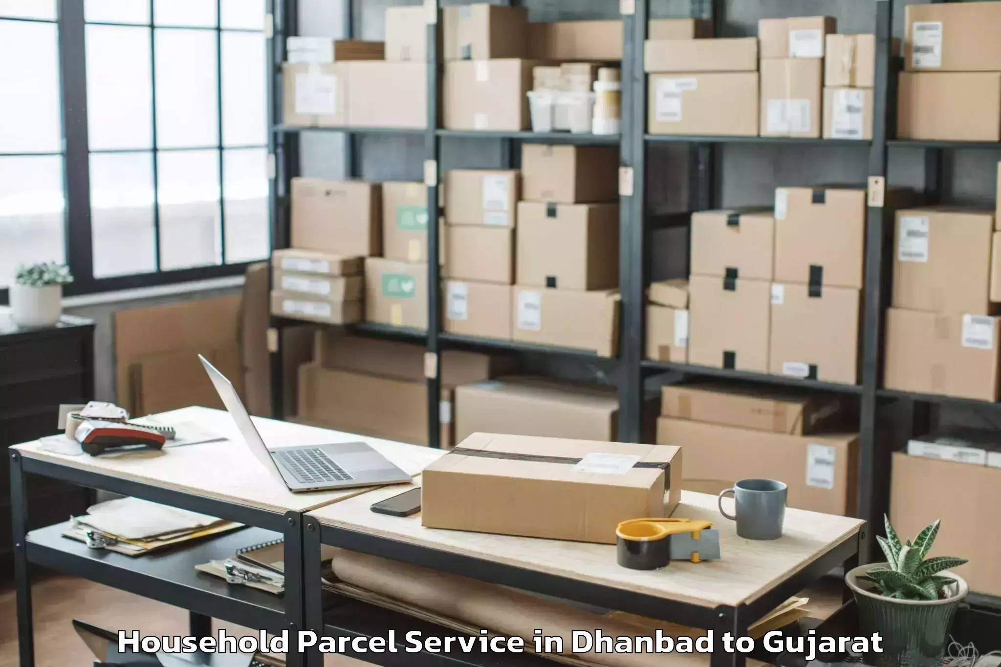 Hassle-Free Dhanbad to Madhav Kampo Household Parcel